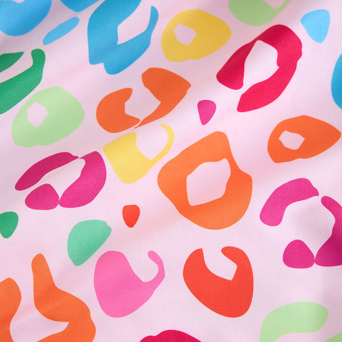 Colorful abstract pattern on a pink background