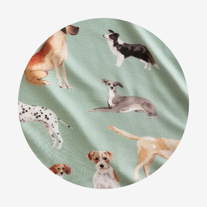Fabric with dog pattern on a light green background