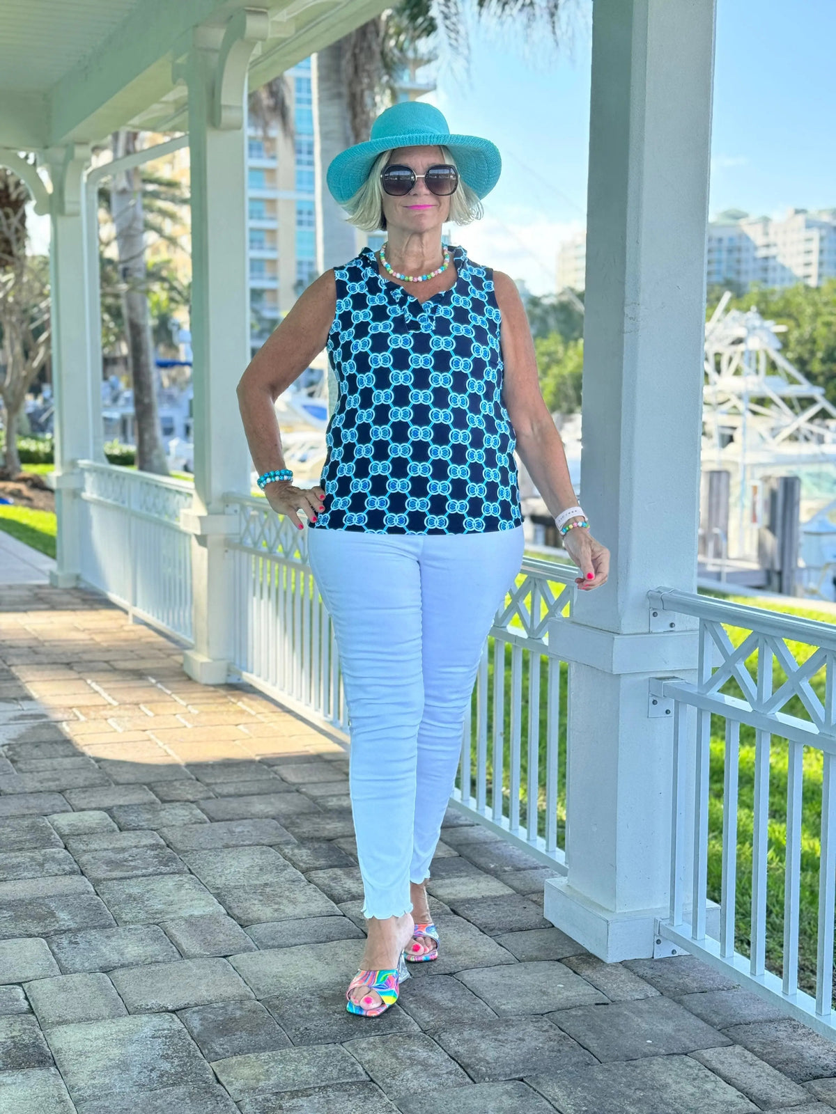 BLUE MEDALLION SLEEVELESS RUFFLE TOP