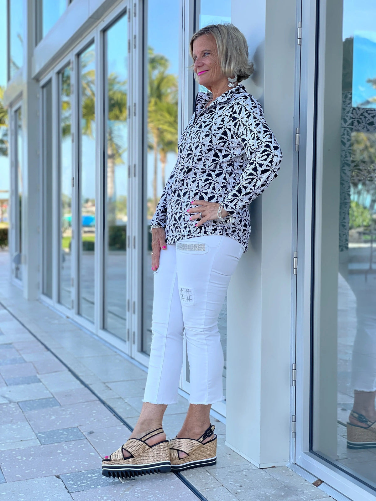 BLACK AND BEIGE PALM ZIPPER TOP