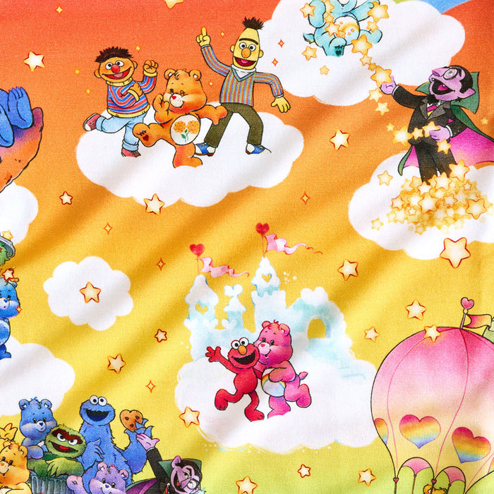 Close up swatch of Sesame Street and Care Bear print.