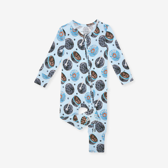 front image of blue one piece with caviar print.