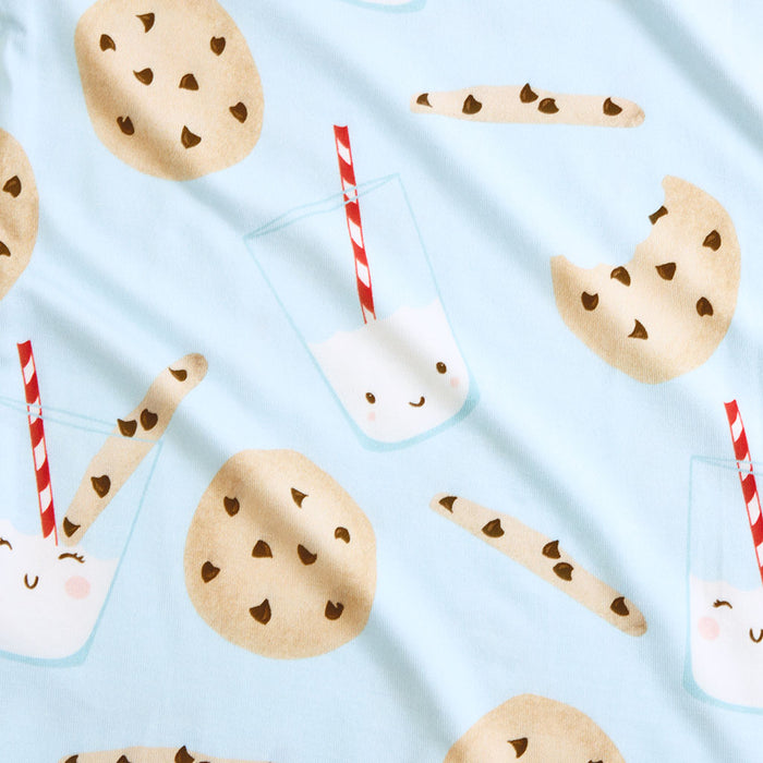 Pattern of cookies, milk, and straws on a light blue background