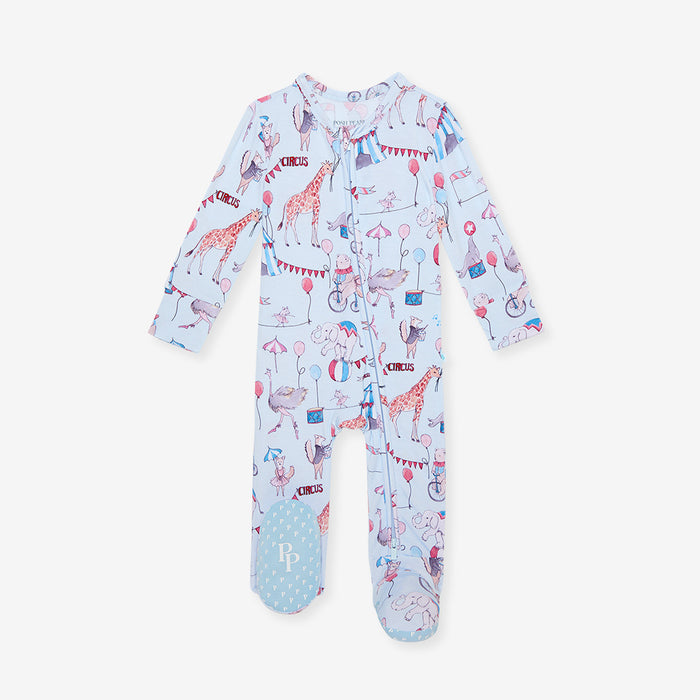 Children's one piece with animal print on a light blue background