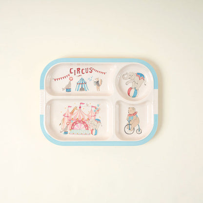 Children's divided plate with circus-themed illustrations on a white background