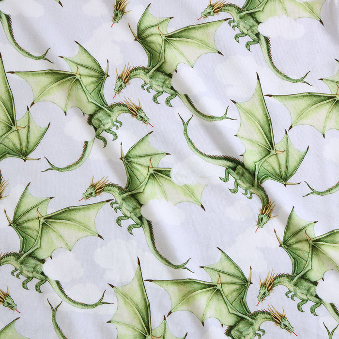 Pattern of green dragons on a white background
