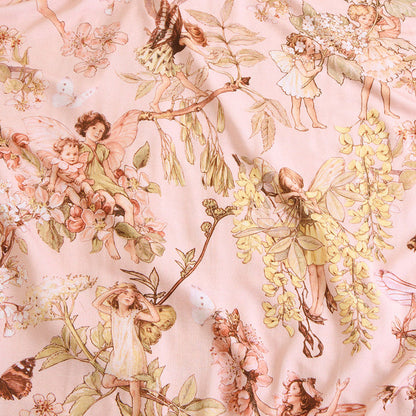 Pattern of fairies and flowers on a light pink background