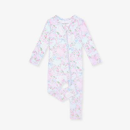 Floral-patterned baby one piece on a white background