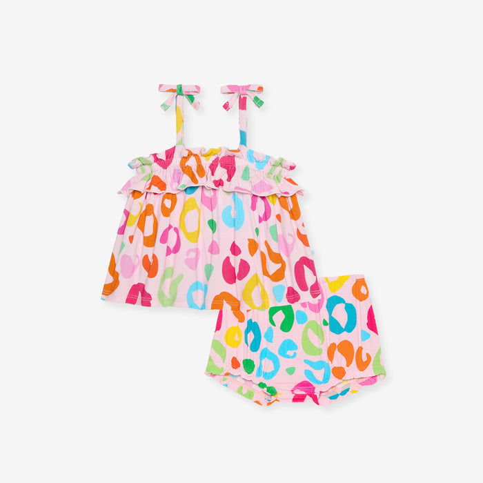 Colorful leopard print short set with pink straps on a white background