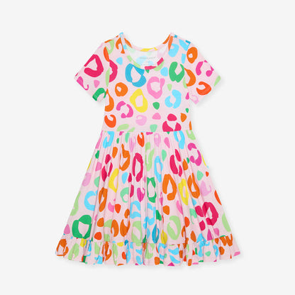 Colorful leopard print dress on a white background