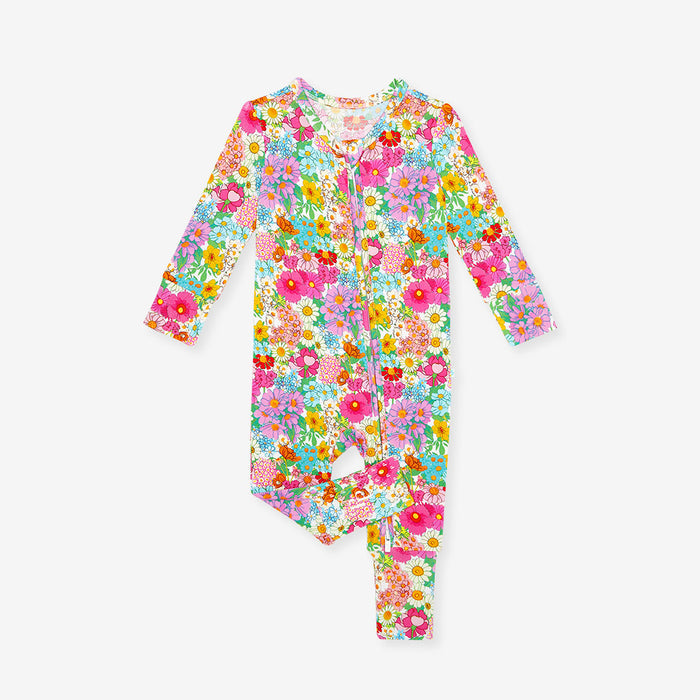 Colorful floral baby one piece on a white background
