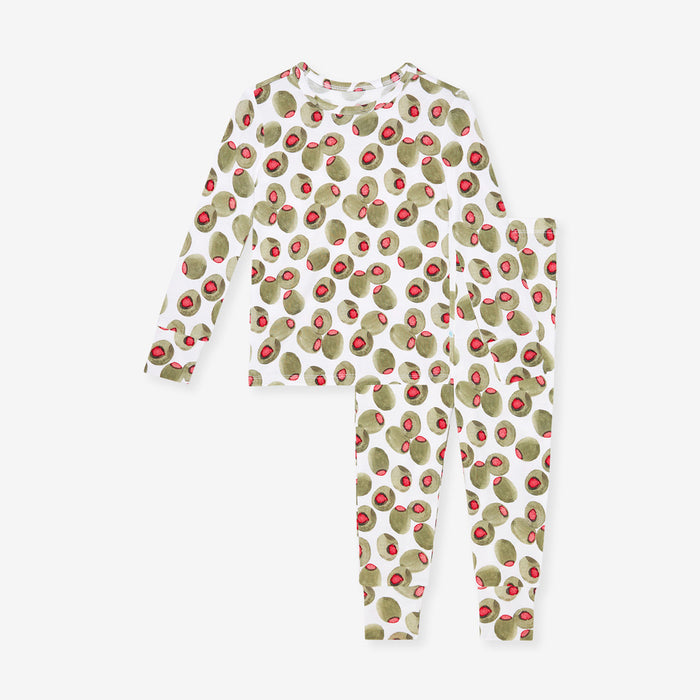 Close up of kid's pajama set with olive print