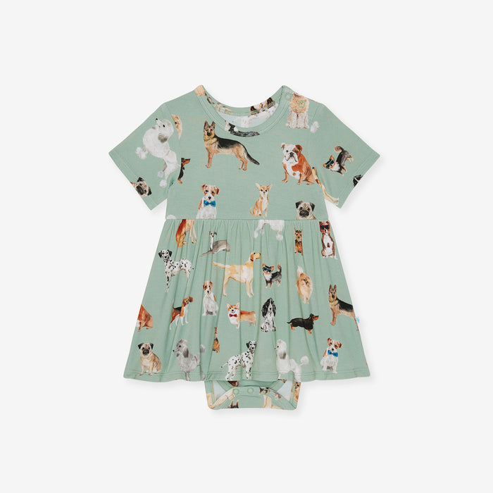 Green dress with dog pattern on a white background
