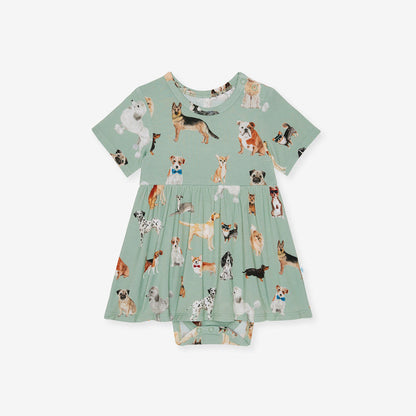 Green dress with dog pattern on a white background