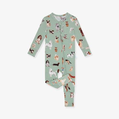 Children's one piece with dog pattern on a light green background