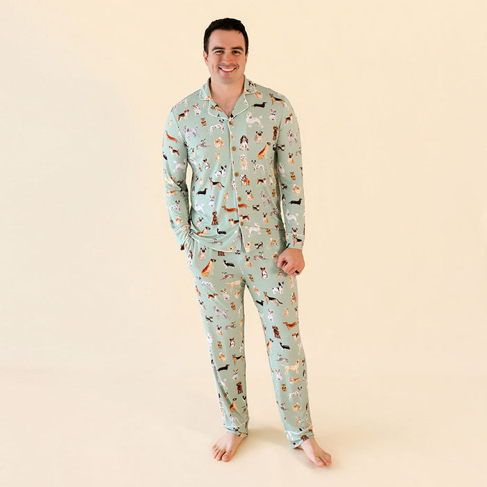 Man wearing a patterned pajama set  on a beige background