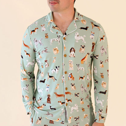 Light blue pajama set with dog pattern worn by a person on a beige background