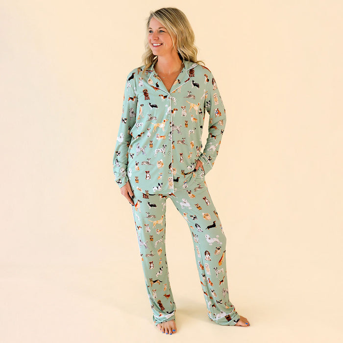 Woman wearing a patterned pajama set on a beige background