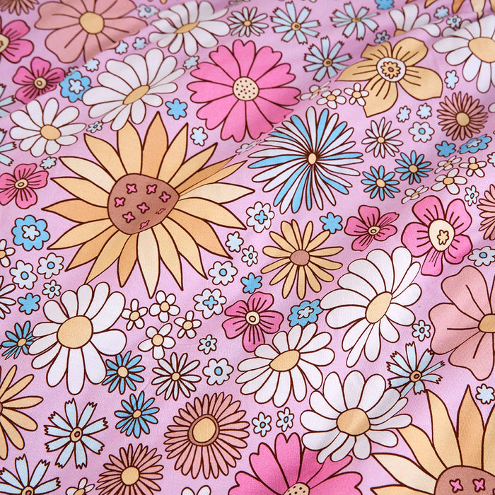 Colorful floral pattern on a pink background