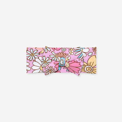 Floral patterned headband on a white background