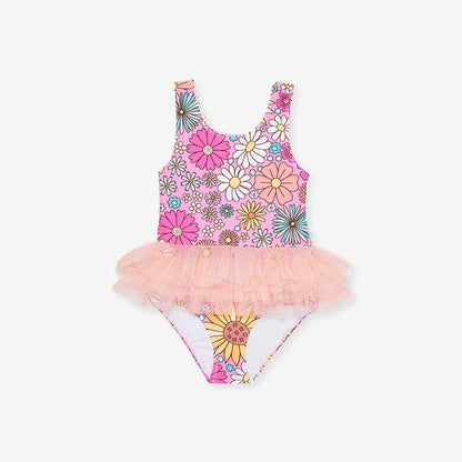 Children's swimsuit with floral design and tutu skirt on a white background