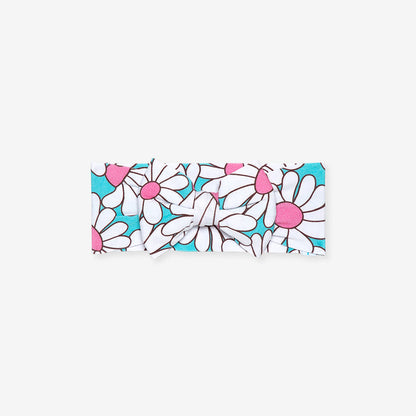 Floral patterned headband on a white background