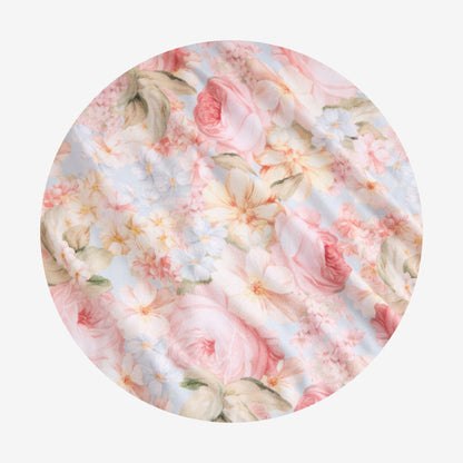 Floral patterned fabric with pink and white flowers on a light background