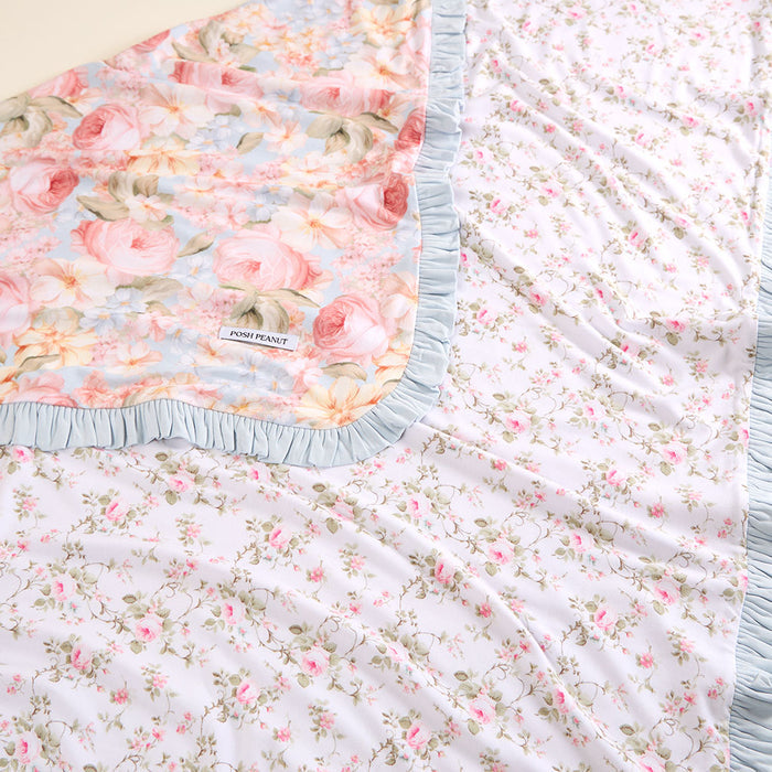 Floral patterned fabric with a brand label on a beige background