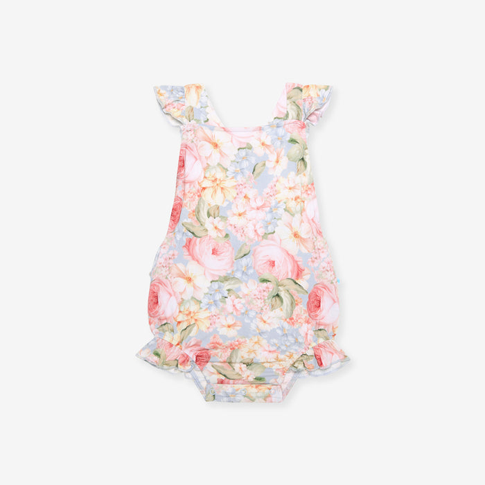image of floral romper on a white background
