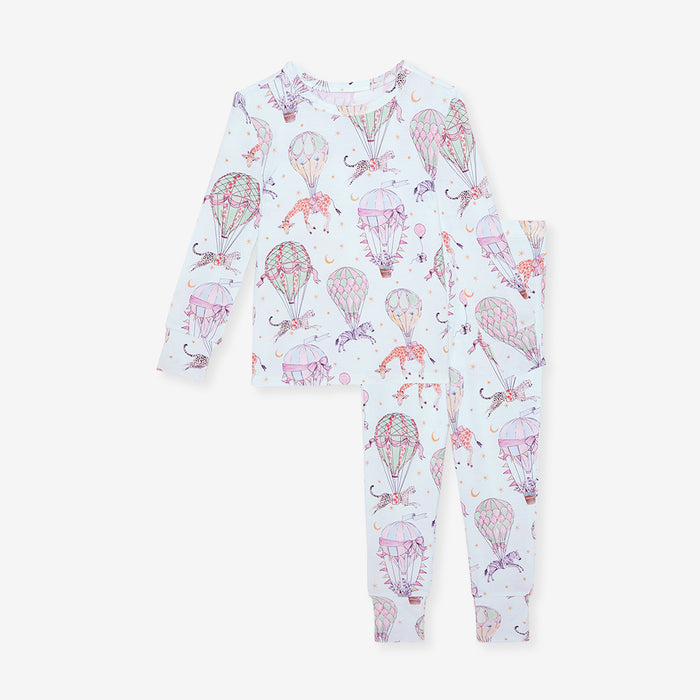 Children's pajama set with hot air balloon and elephant pattern on a white background