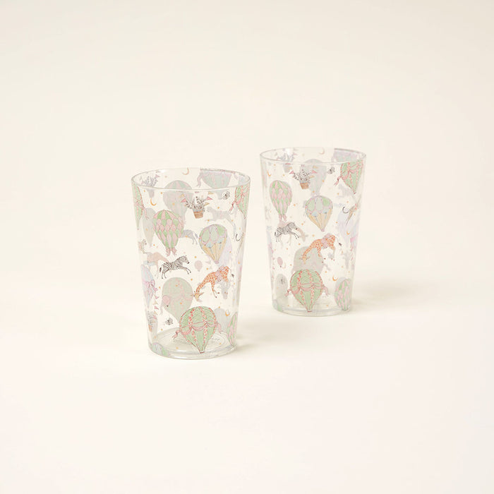 Two clear glasses with colorful animal illustrations on a white background
