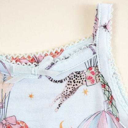 Floral and animal print bodysuit picot close up on a light background