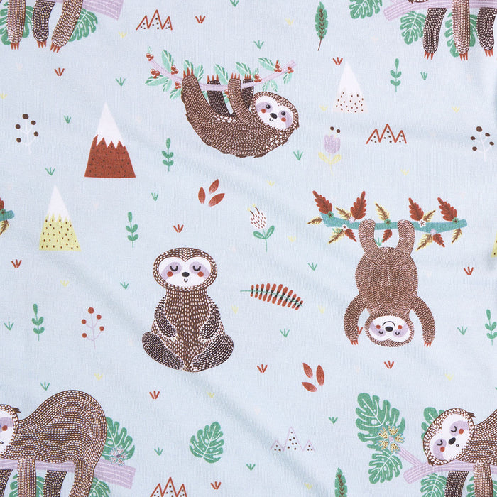 Fabric with sloth pattern on a light blue background