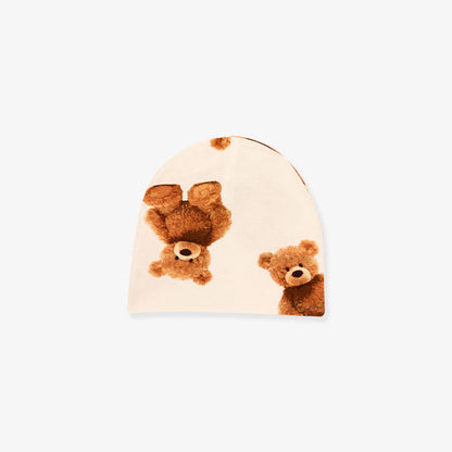 beige beanie with teddy bear design on a white background