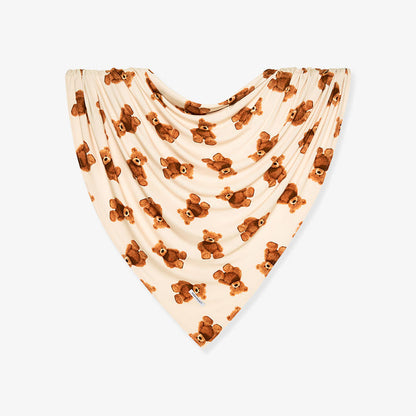 Baby swaddle with brown teddy bear pattern on a white background