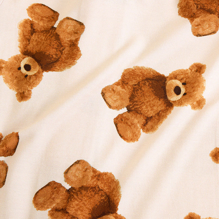 Pattern of brown teddy bears on a beige background