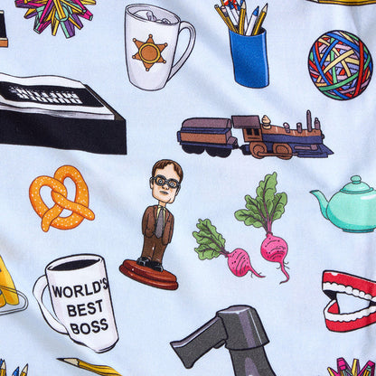 fabric closeup with various illustrations from The Office television show including a person, coffee cup, train, and pretzel on a light blue background